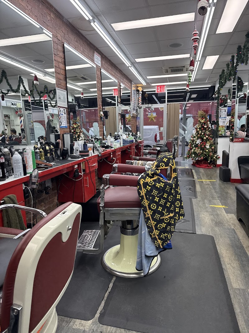 Inside Lugo Barber Shop — barber chairs and brick columns